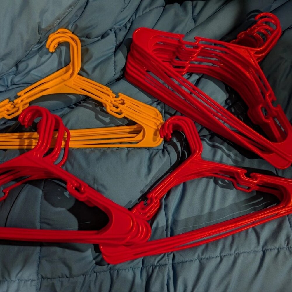 45 Plastic Hangers Red & Yellow